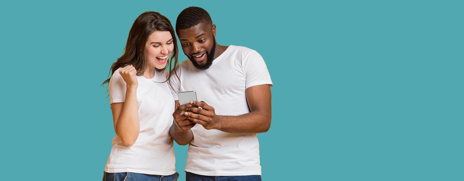 Man and woman looking at a  mobile phone