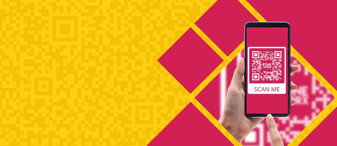 hand holding phone scanning a QR code